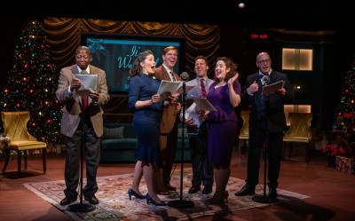 (left to right) Manny Buckley, Audrey Billings, Brandon Dahlquist, Ian Paul Custer, Dara Cameron, Joe Dempsey in American Blues Theater's 'It's A Wonderful Life: Live in Chicago!'