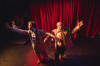 The Con is On in Neo-Futurist's "Trust Us/Screw You"