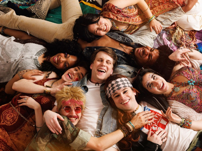 Pictured (center) Gavin Rhys with (clockwise from top) Amy Yesom Kim, Joshua Emmanuel, Catherine Rodriguez O'Connor, Zac Richey, Stone TeSelle, Nicki Rossi and Chosen Mitchell in a publicity image for Kokandy Productions' revival of HAIR.