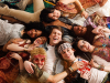 Pictured (center) Gavin Rhys with (clockwise from top) Amy Yesom Kim, Joshua Emmanuel, Catherine Rodriguez O'Connor, Zac Richey, Stone TeSelle, Nicki Rossi and Chosen Mitchell in a publicity image for Kokandy Productions' revival of HAIR.
