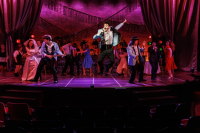 Abraham Deitz-Green as Robbie Hart and cast in The Wedding Singer at Metropolis Performing Arts Center