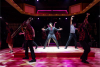 TYler Hanes (center) as Elvis Presley in Heartbreak Hotel at Marriott Theatre.