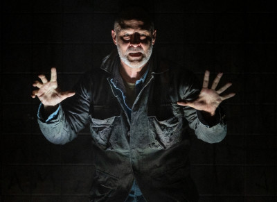 Timothy Edward Kane as The Poet, in "An Iliad" at Court Theatre.